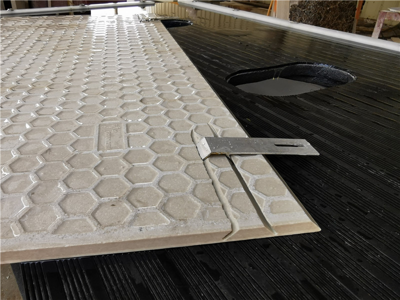 install marble panels with metal fasteners in the predetermined positions